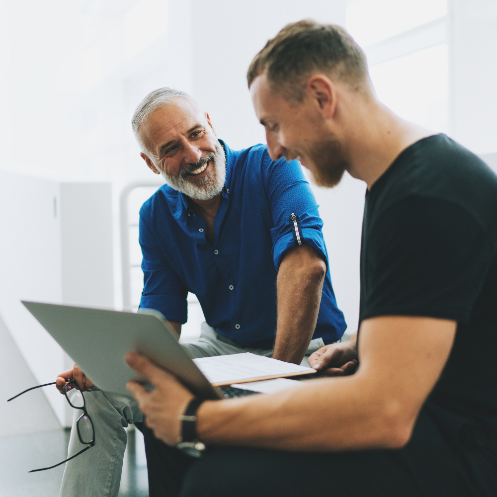 Two Males Conversing and providing Feedback